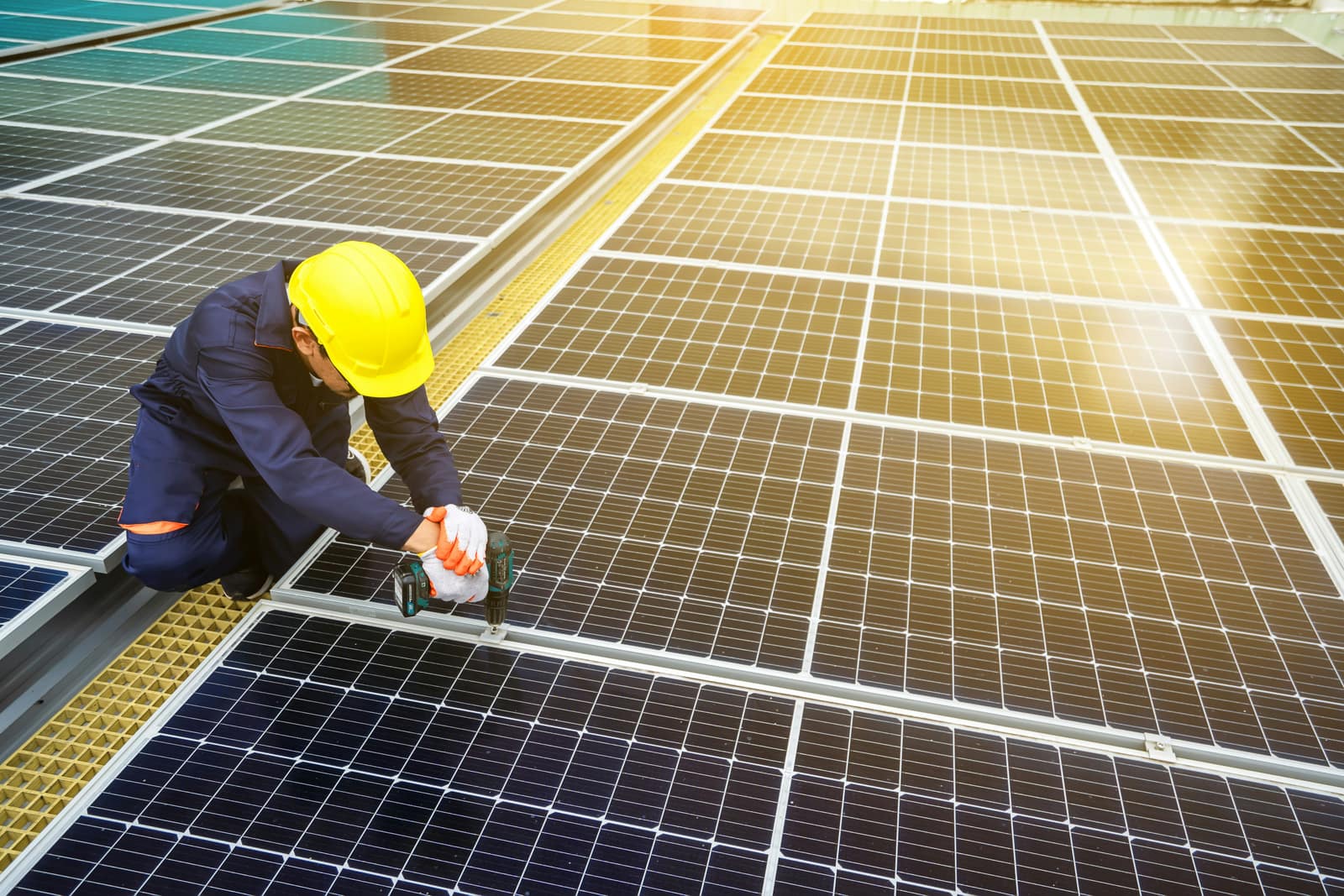 SolarHouse NG technicians mounting solar panels on a client's rooftop